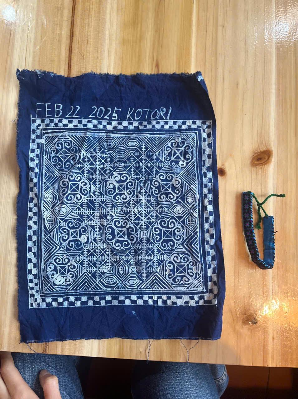 A finished batik piece, dated and ready to take home
